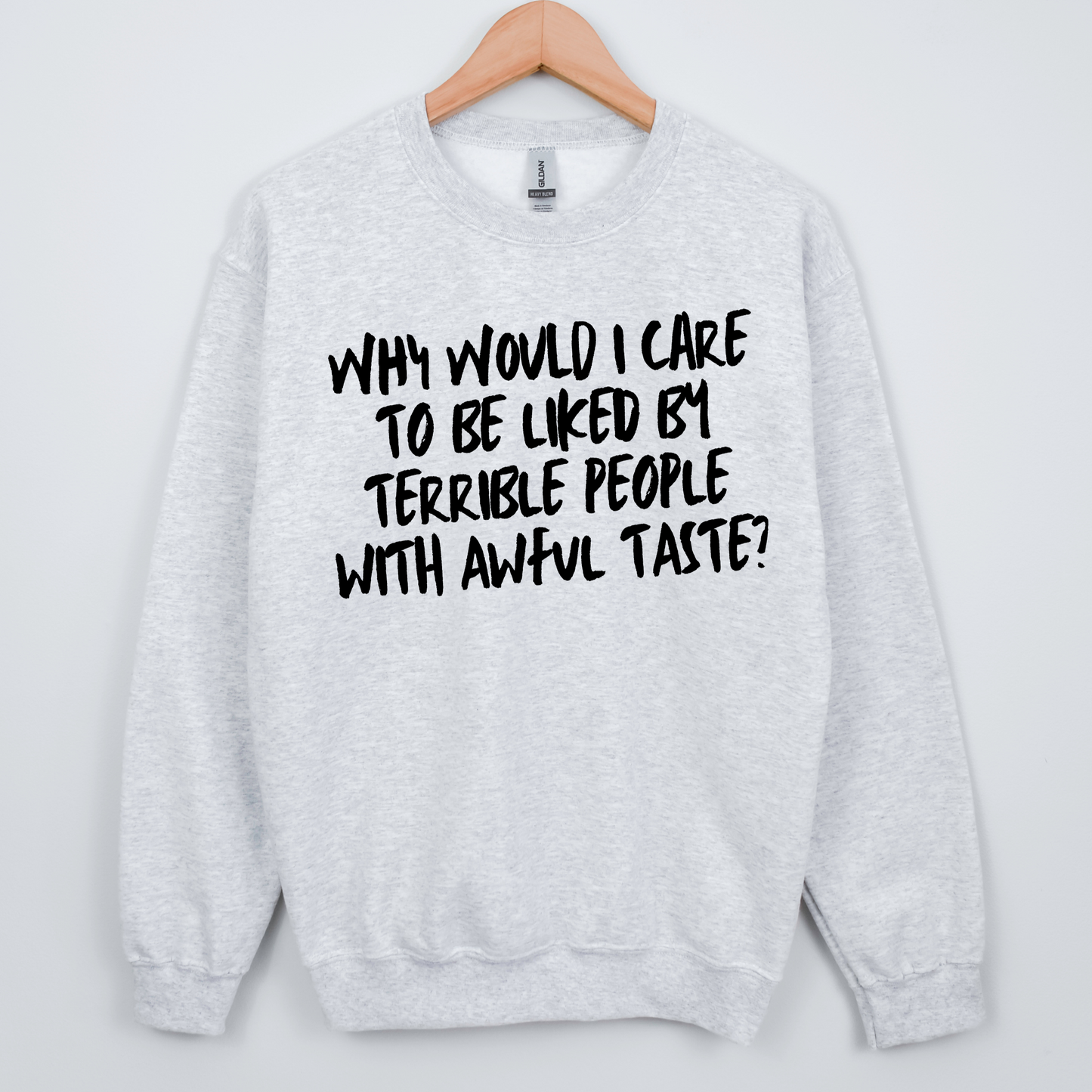 Gray sweatshirt with black text on a light blue background